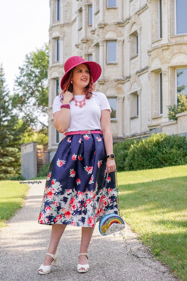 Winnipeg Style, Canadian Fashion blog, stylist, Chicwish navy rose print midi vintage style skirt, Chie Mihara cream white Gada sandals, Mary Frances one of a kind rainbow sun beaded clutch bag, Scala pink straw hat, summer style, modern vintage